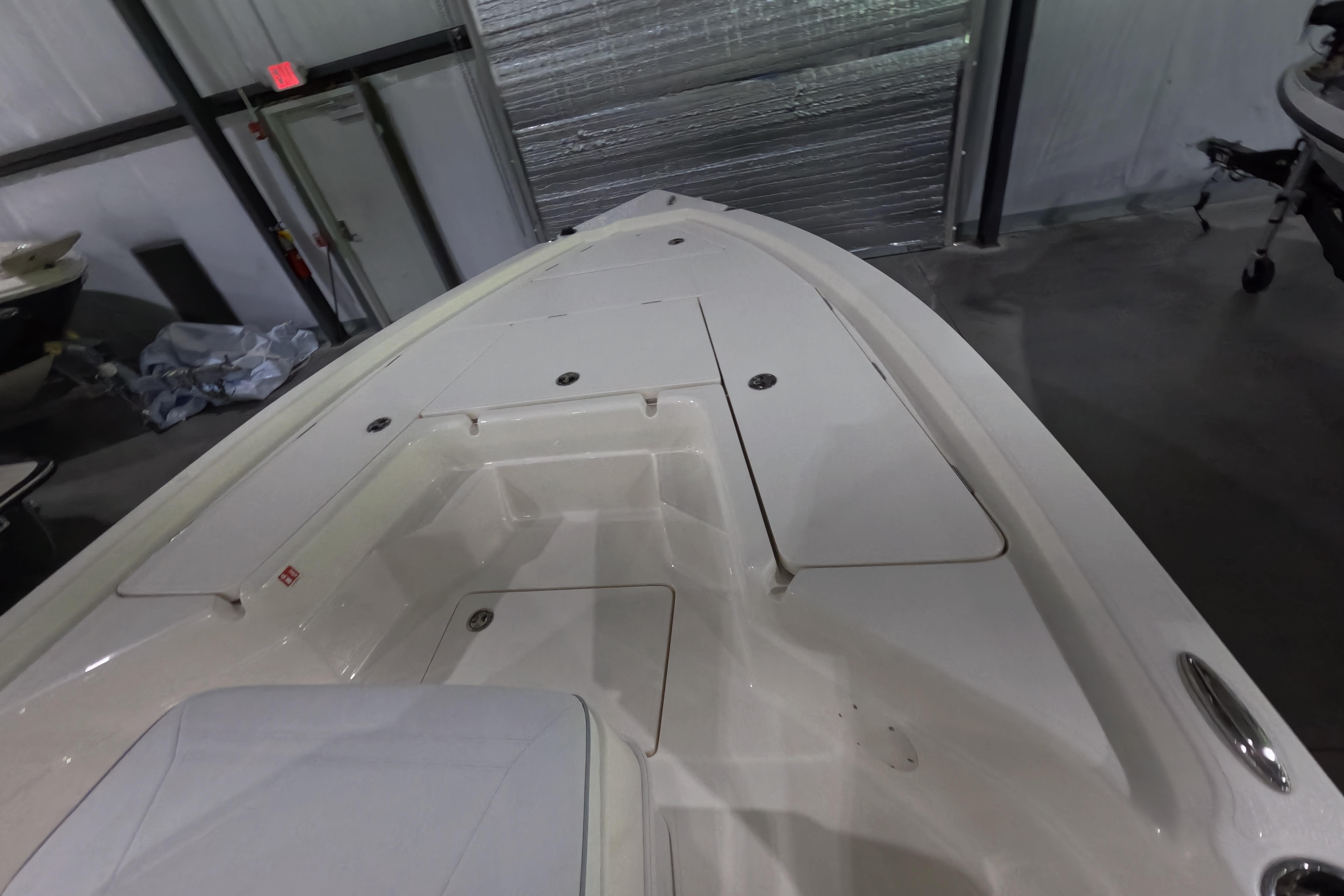 2026 Skeeter SX221 boat interior, showcasing spacious deck and storage compartments.