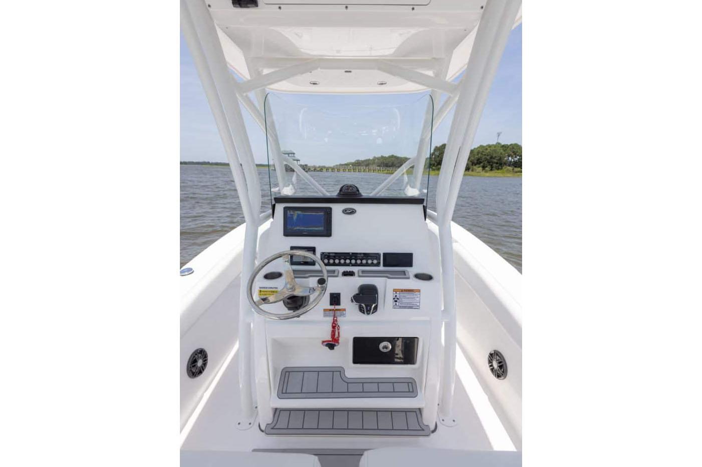 Manufacturer Provided Image: 2025 Sea Fox 228 Commander boat console with steering wheel and navigation equipment.