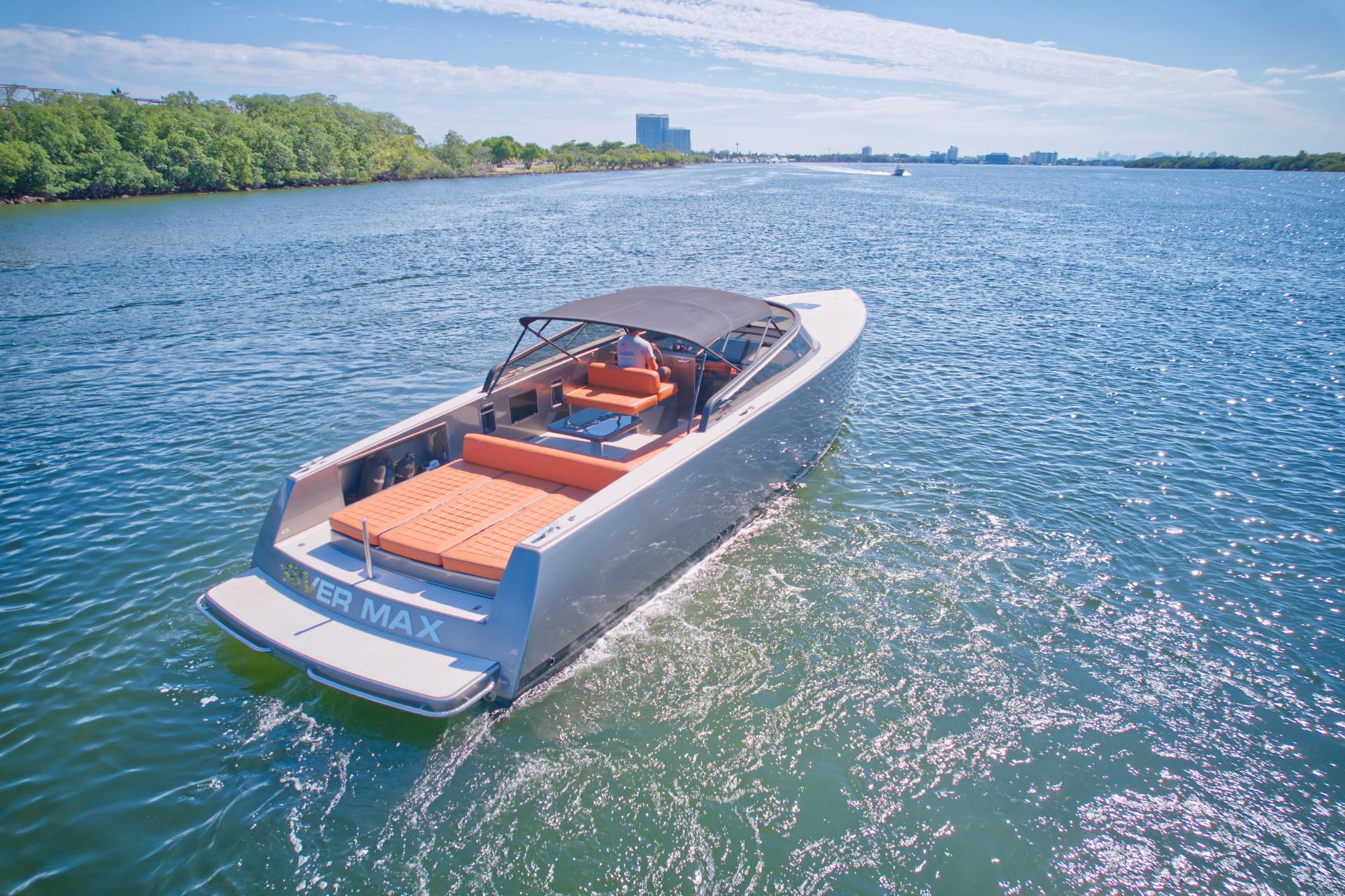 2015 VanDutch 40 luxury yacht cruising on a sunny day.