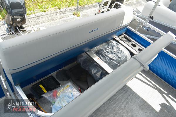 2024 Lowe Ultra 200 Cruise boat interior storage compartment with open seat.