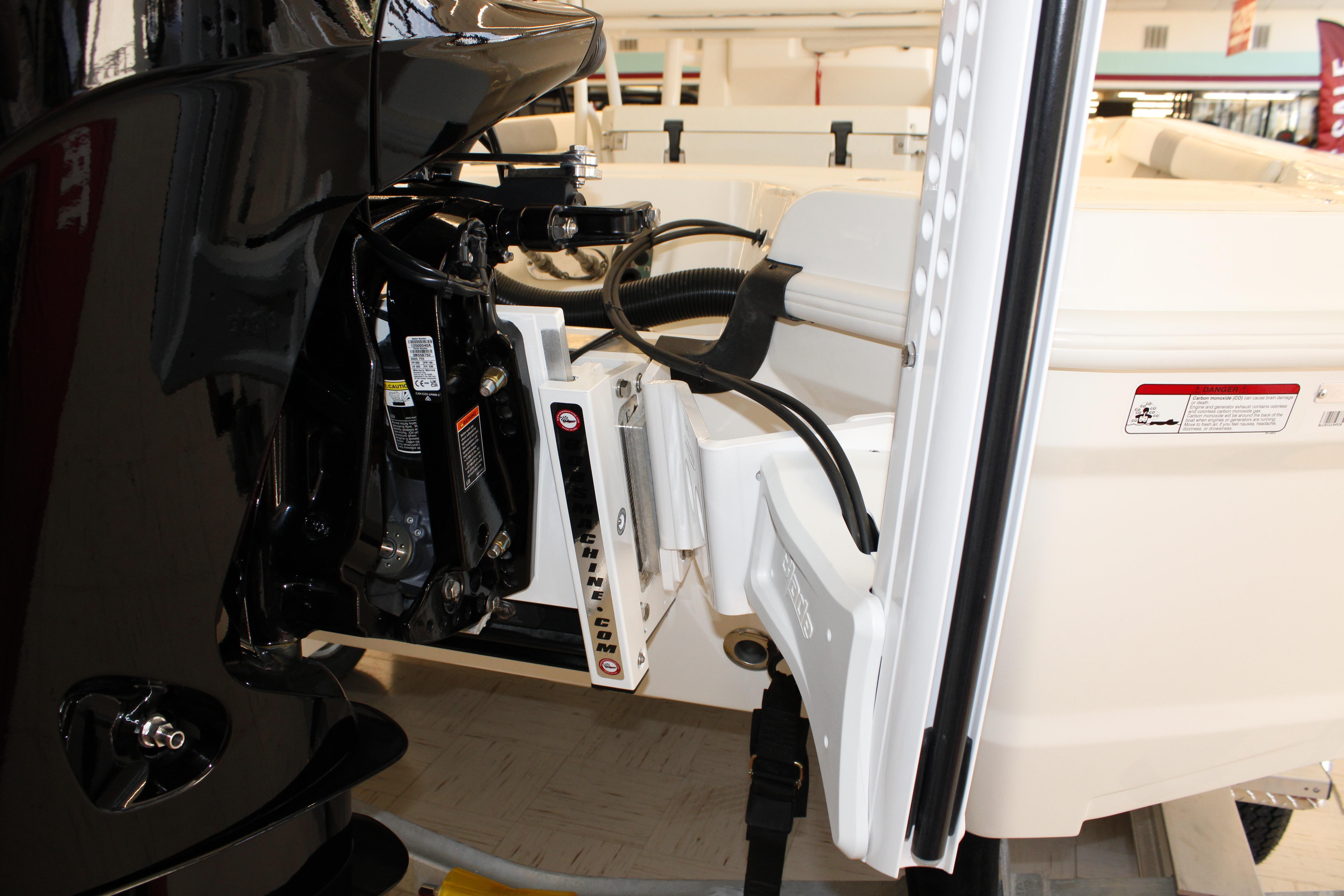 Close-up of 2026 Mako 24 APEX boat engine and hydraulic system.