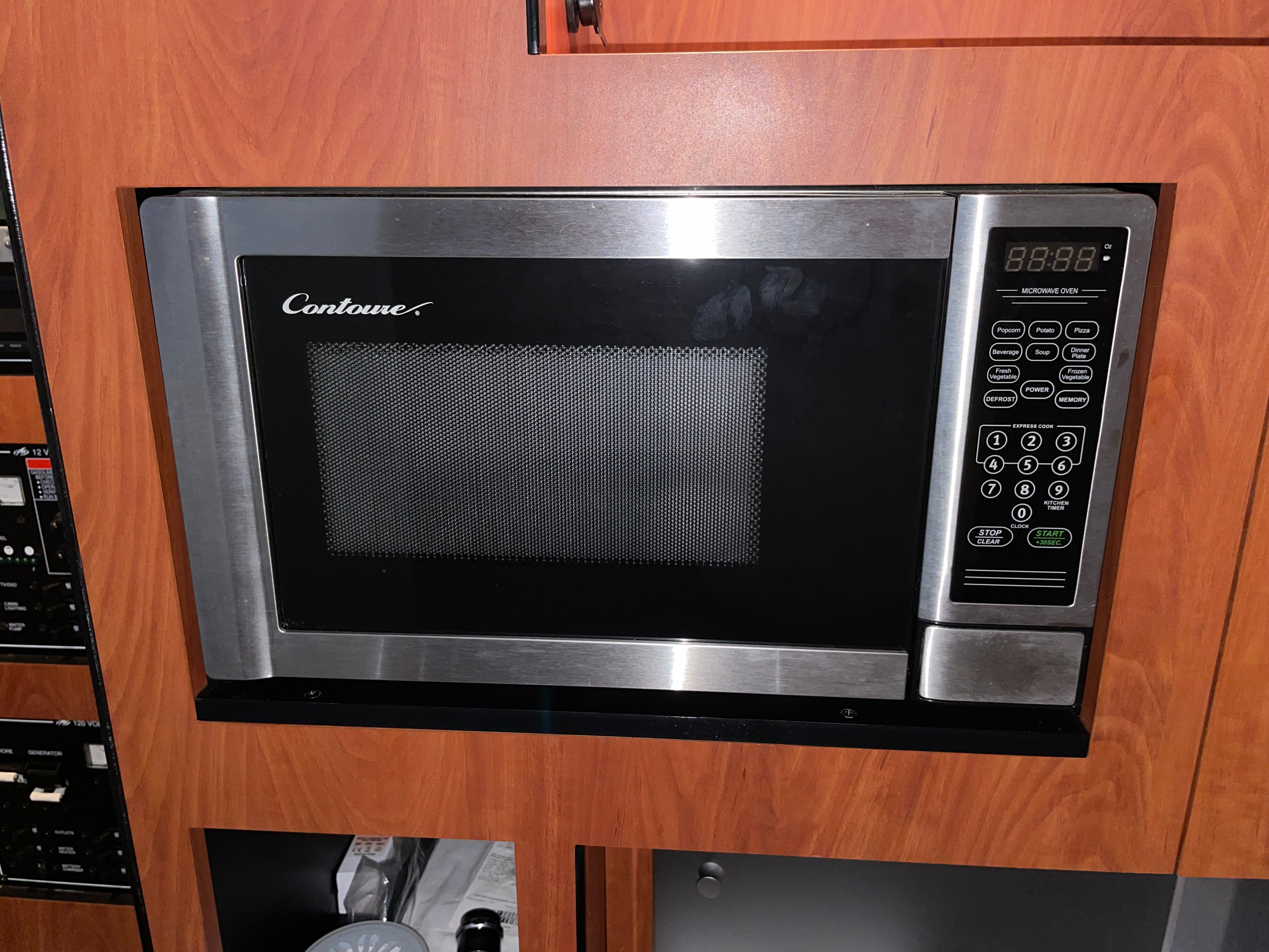 Microwave in a 2010 Monterey 280 Sport Cruiser yacht.