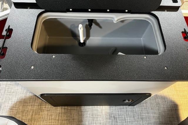 Livewell compartment in 2026 Sun Tracker SportFish 22 DLX boat.