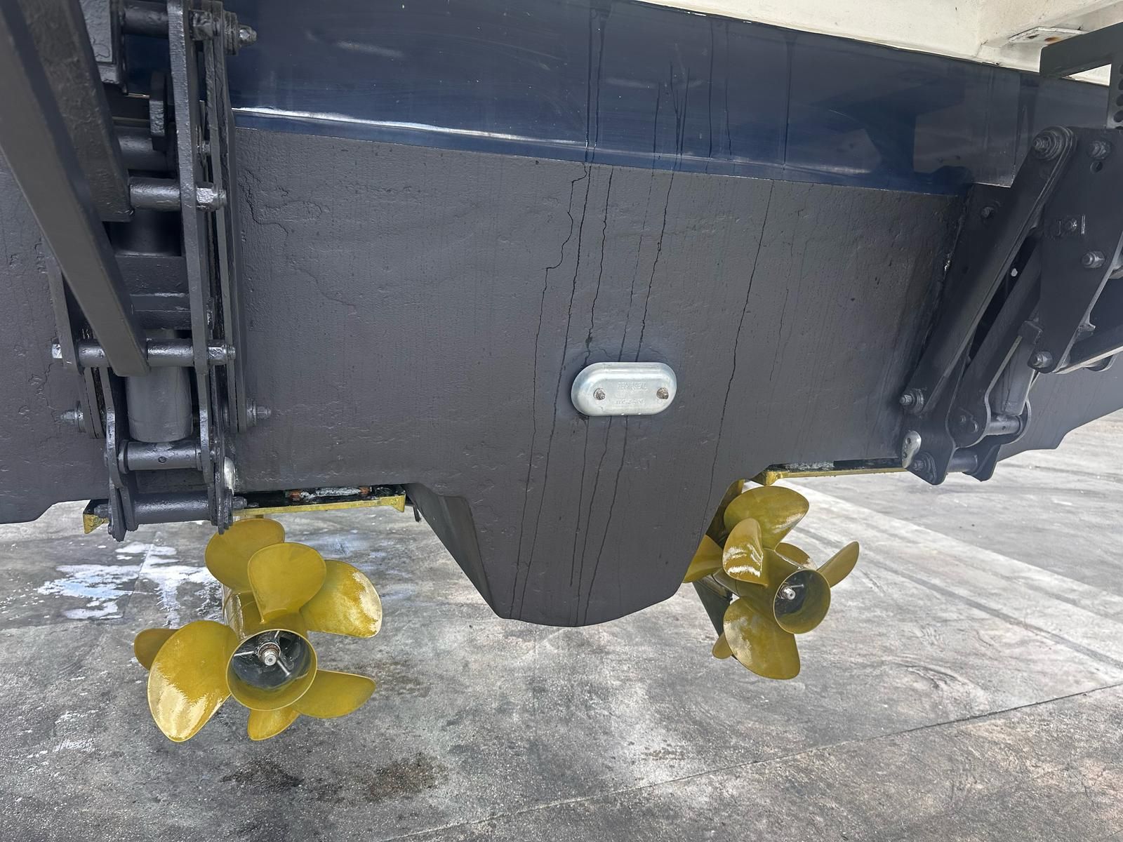 Rear view of a 2010 Sea Ray 450 boat with propellers.