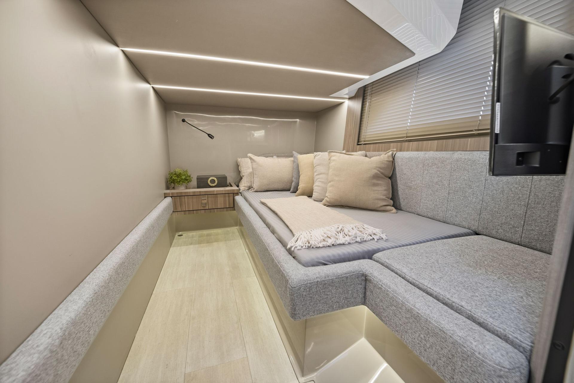 Luxurious interior of 2026 Hanover 447 with modern seating and ambient lighting.