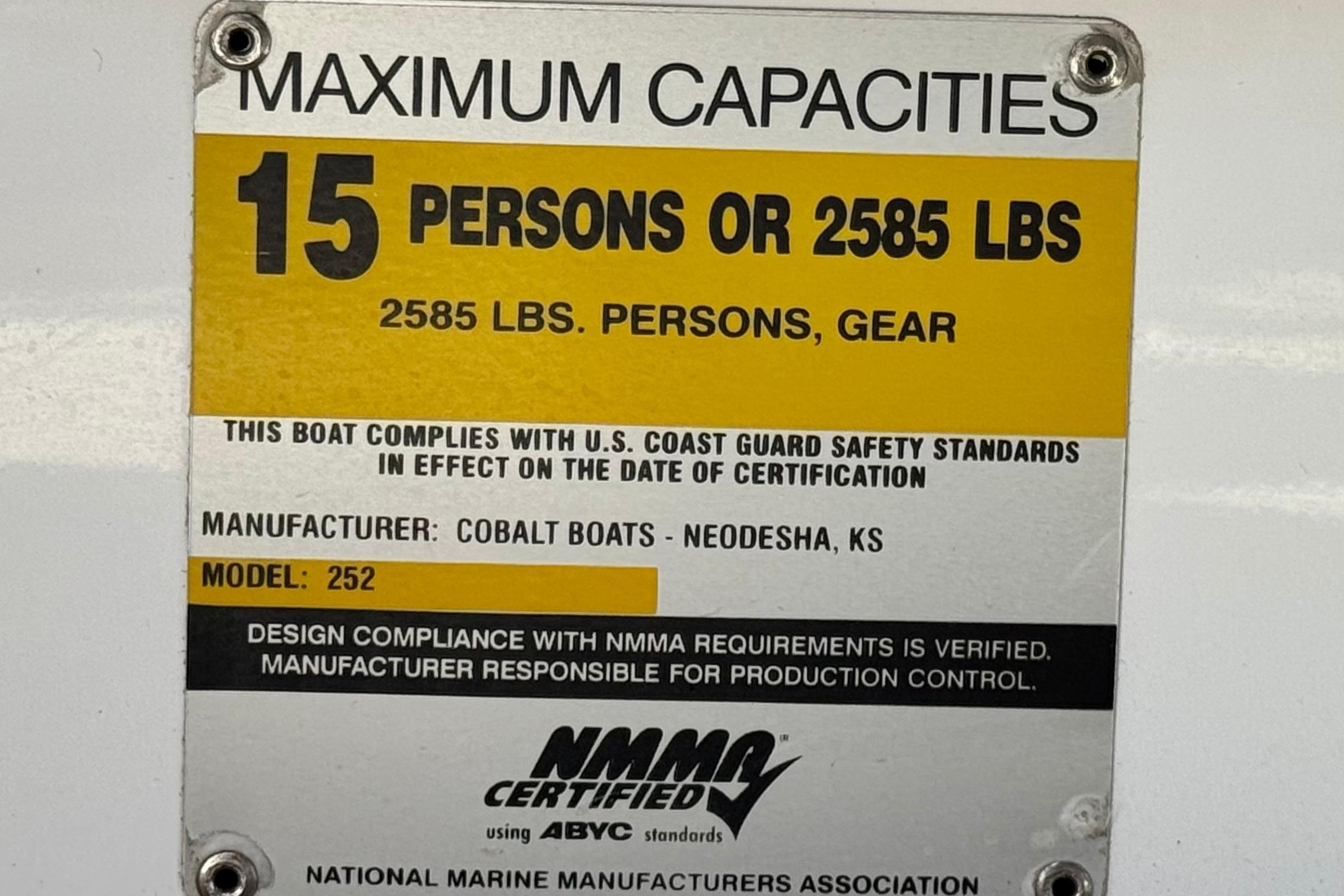 2008 Cobalt 262 capacity plate: 15 persons or 2585 lbs, NMMA certified.
