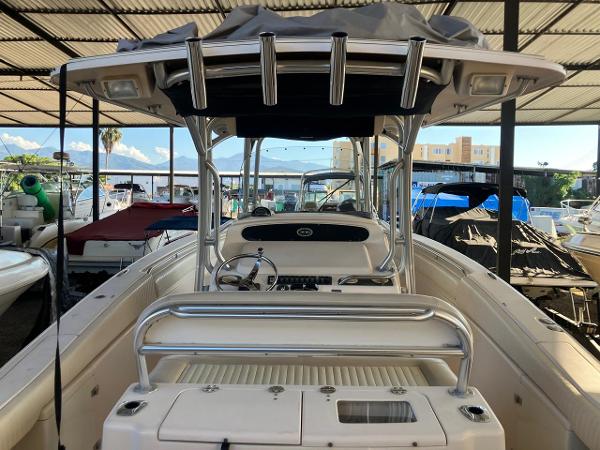 2006 Grady-White Bimini 306 boat in covered marina, front view.