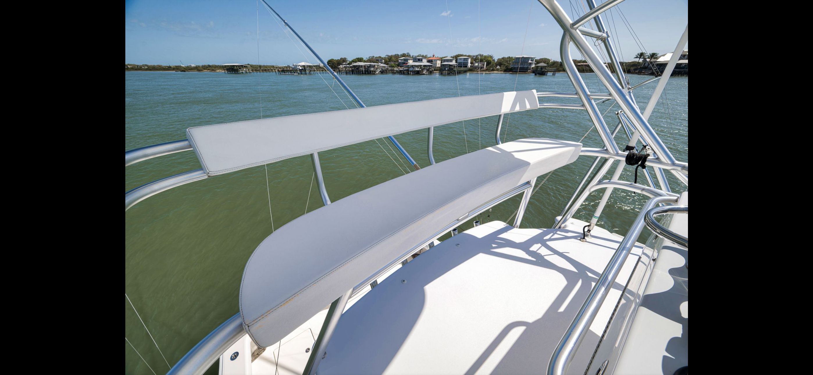 Mag Bay 42 Express 2022 on calm water with clear view.