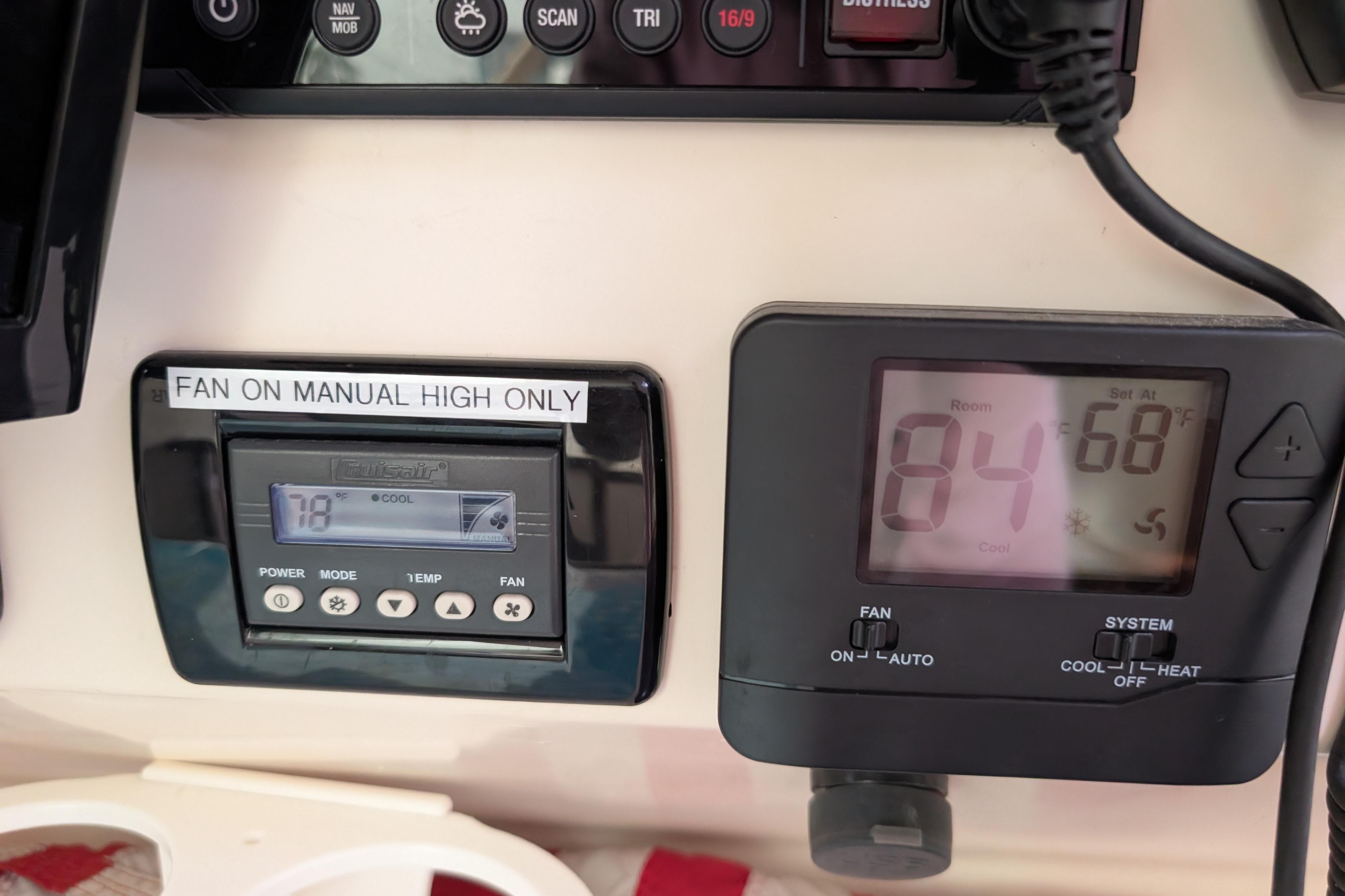 Control panel on a 1999 Island Spirit 37, displaying temperature settings and fan controls.