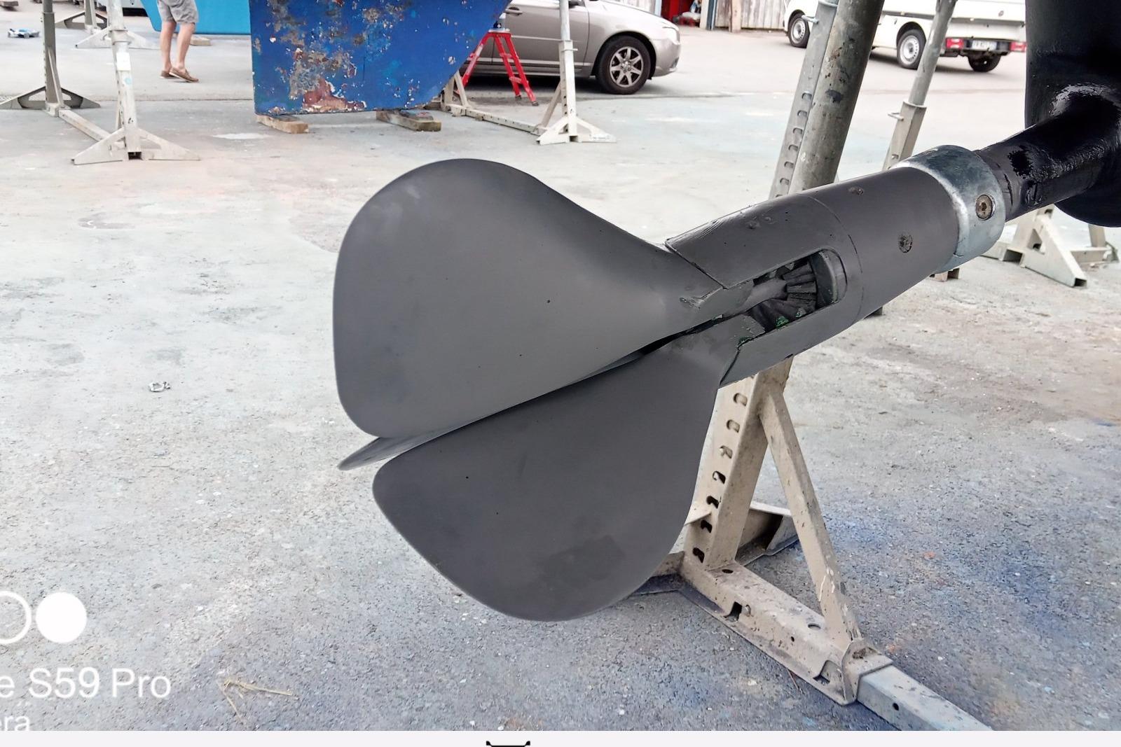 Propeller of 1986 Beneteau Oceanis 350 sailboat on dry dock.
