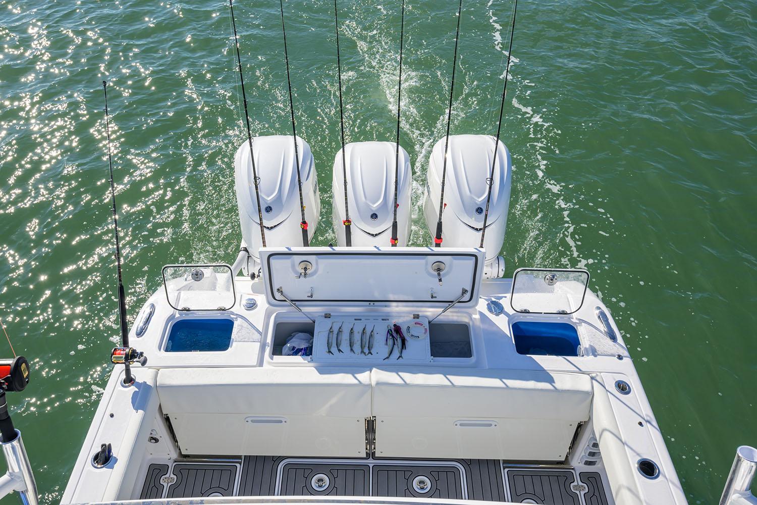 Manufacturer Provided Image: 2025 Everglades 375 Center Console boat with fishing rods and outboard motors.