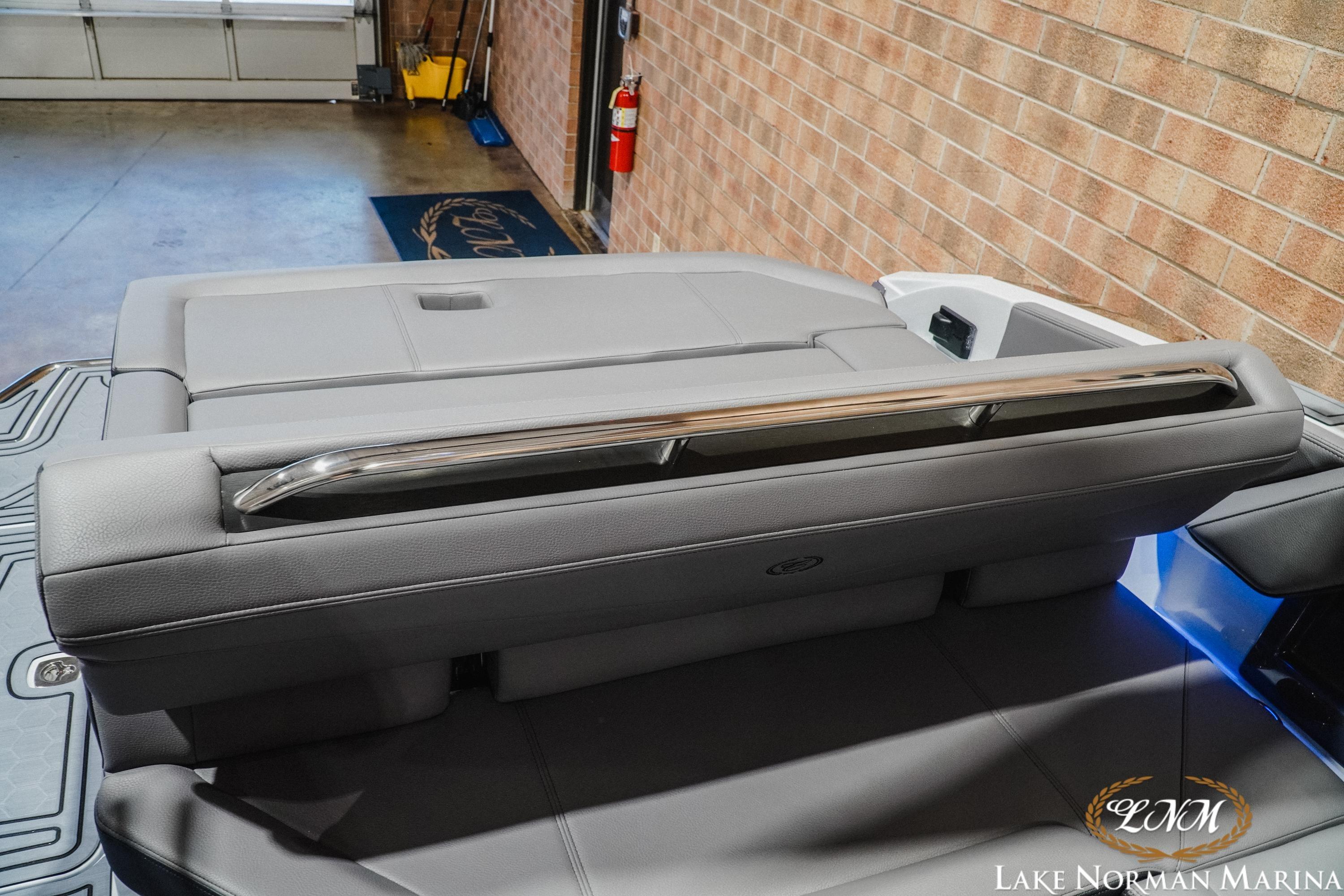 2026 Cobalt R4 Surf boat interior with sleek gray seating and modern design.