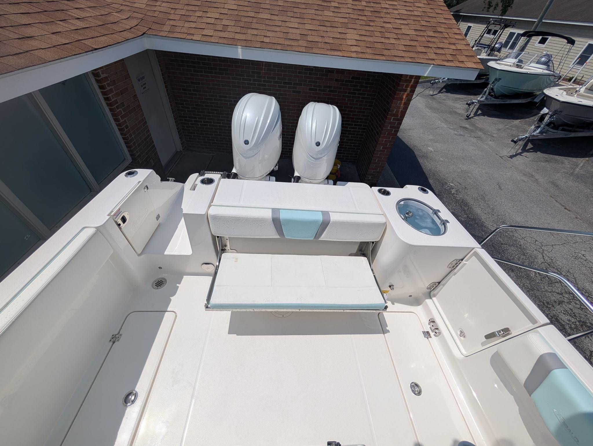 2025 Robalo R250 Center Console boat with dual engines and spacious deck layout.