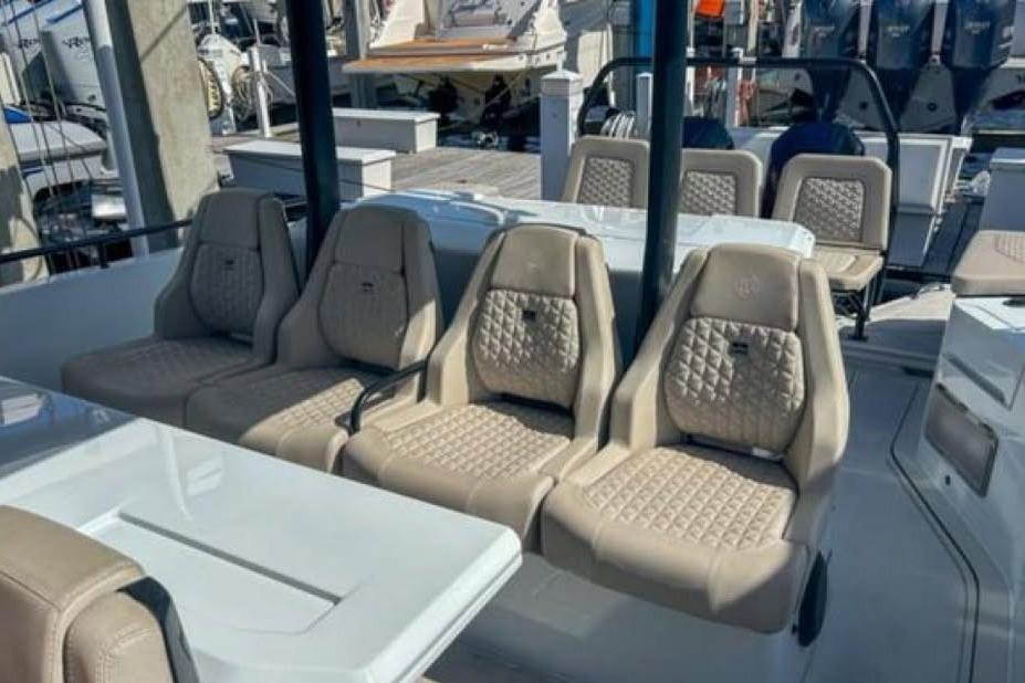 Luxurious seating on 2023 BRABUS Shadow 900 ST boat, featuring elegant quilted upholstery.