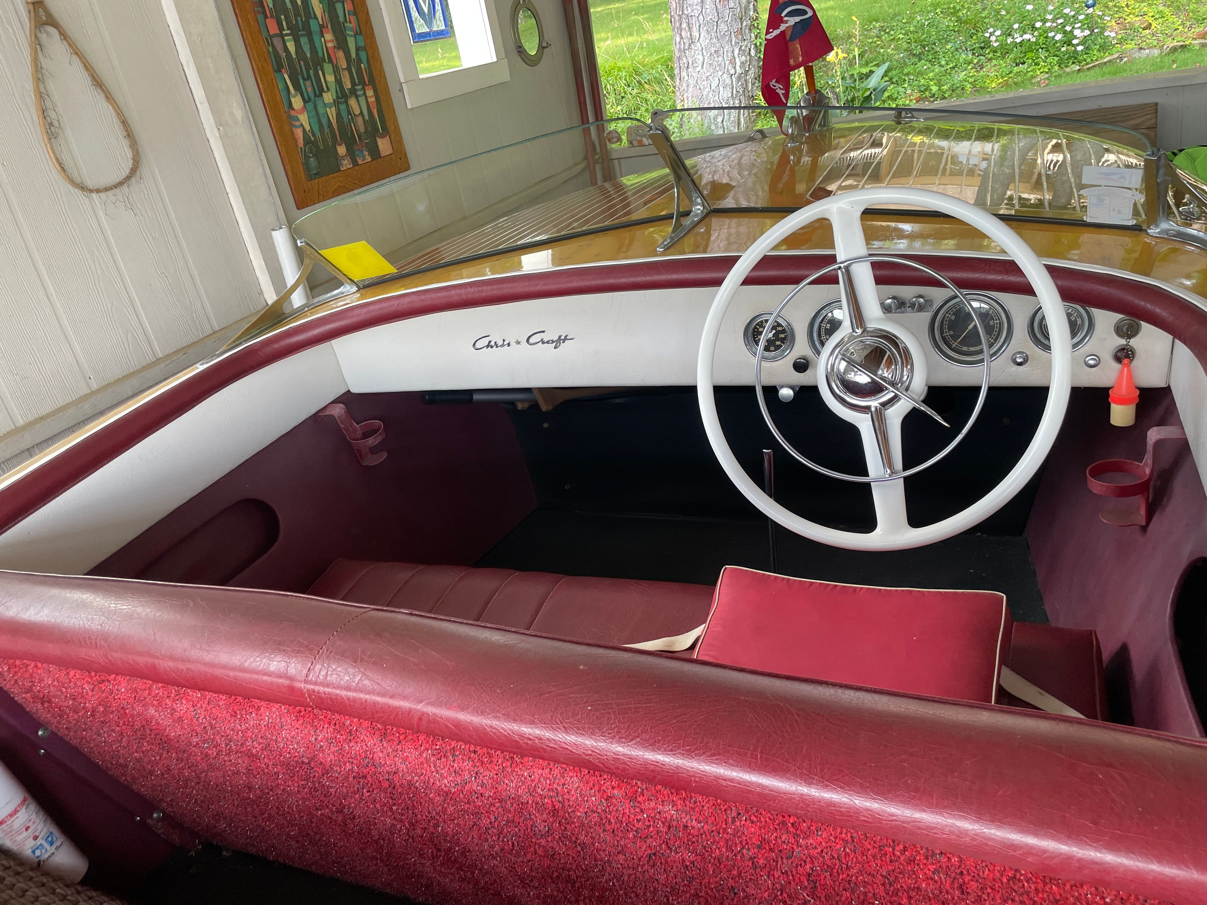 Interior of a 1954 Chris-Craft Riviera boat with red leather.