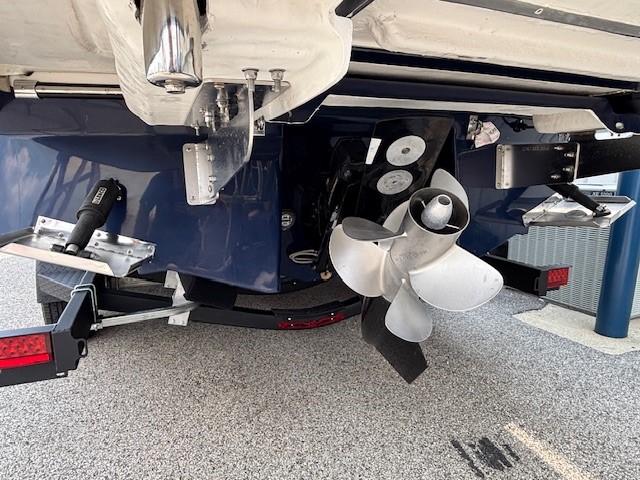 2026 Chaparral SSX 6 boat stern with propeller and trim tabs.