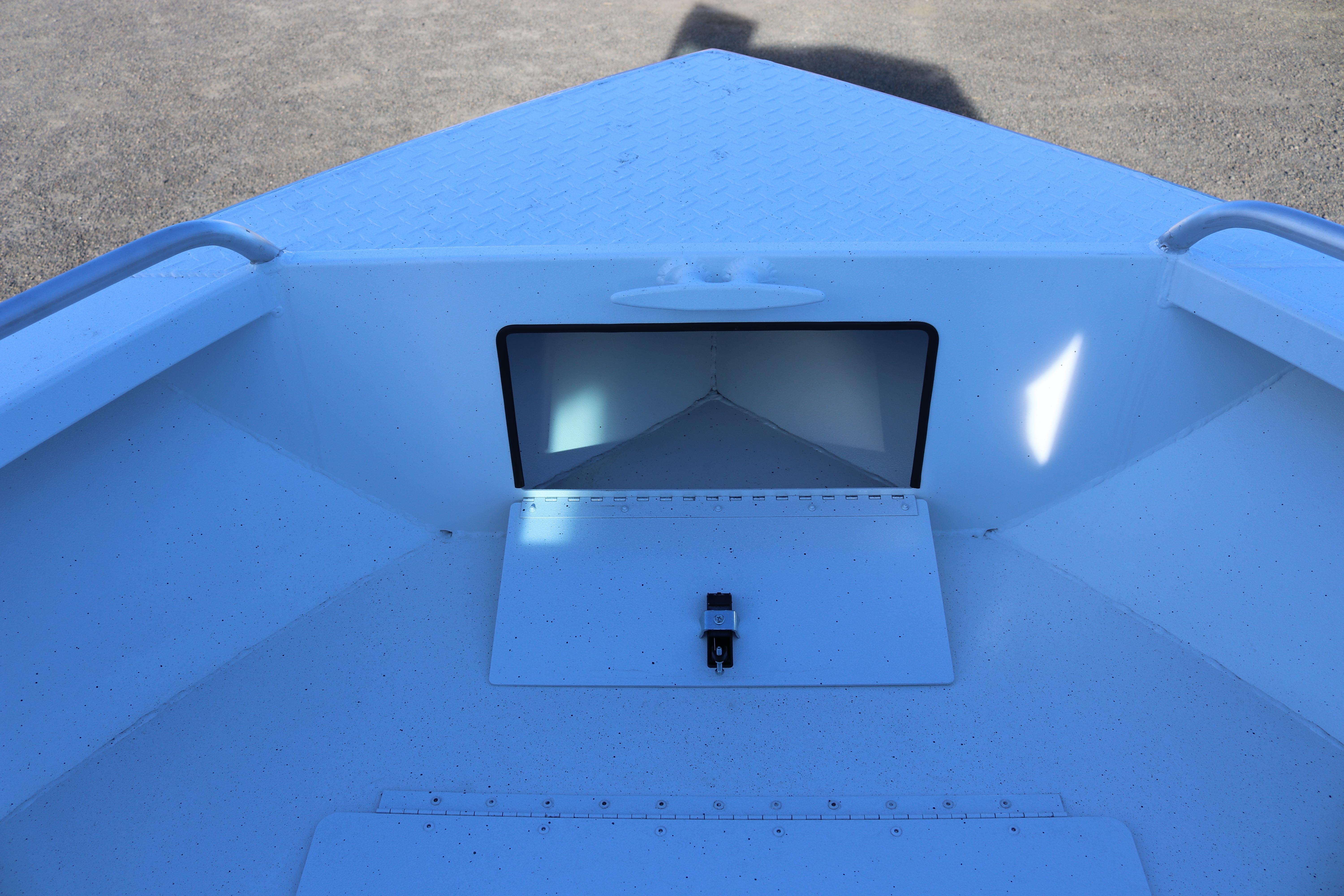 2026 Alumaweld Intruder Outboard 22 boat interior, featuring storage compartment and sleek design.