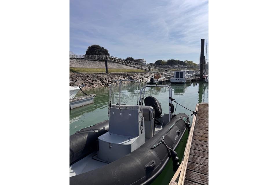 RIB boat docked in a marina, Zeppelin 18v Pro Cup, 2011 model.