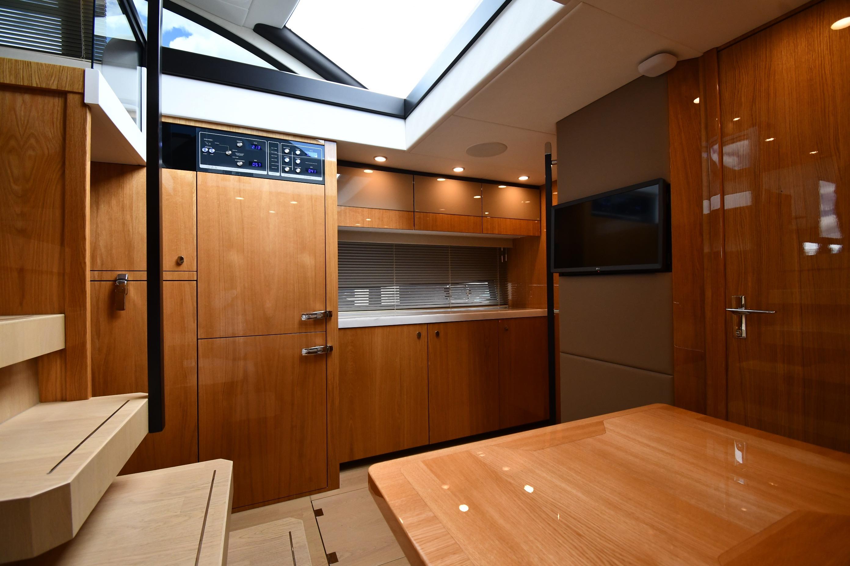 2024 Fairline G50 Targa yacht interior with modern wood finish and sleek design.