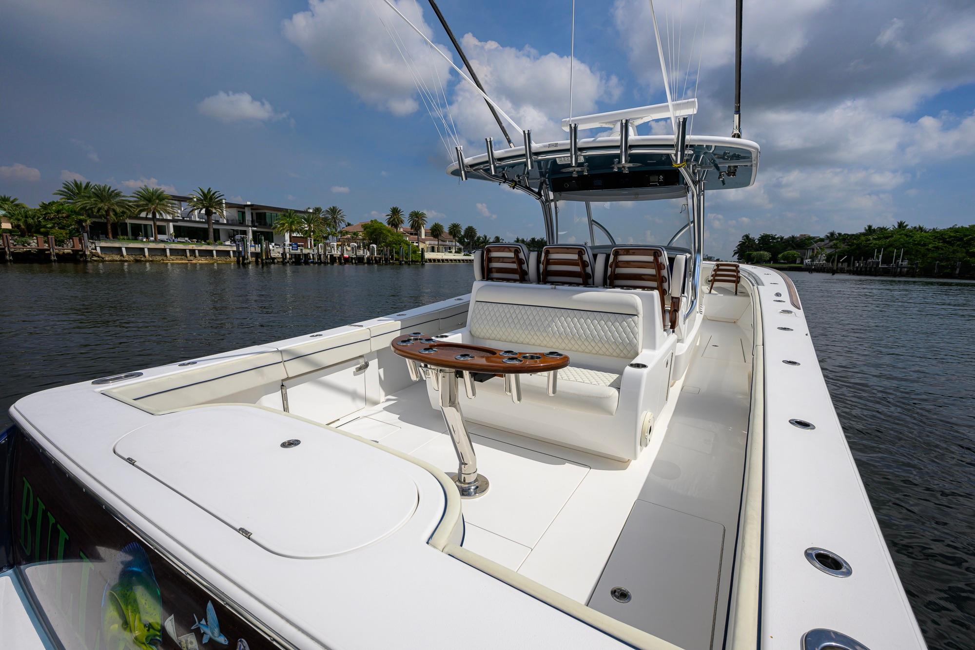 2020 Valhalla Boatworks V-41 on calm water, showcasing spacious deck and seating.