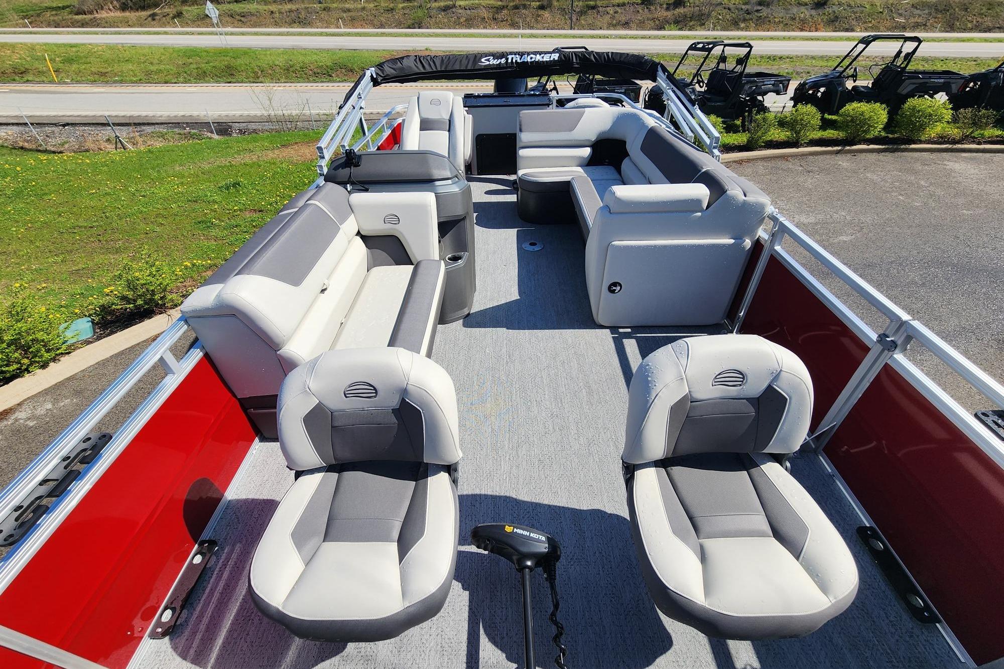 2026 Sun Tracker Fishin' Barge 22 DLX with spacious seating and modern design.