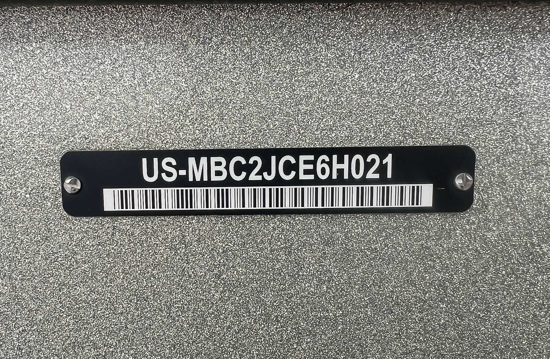 MasterCraft XT22 2021 serial number plate on silver surface.