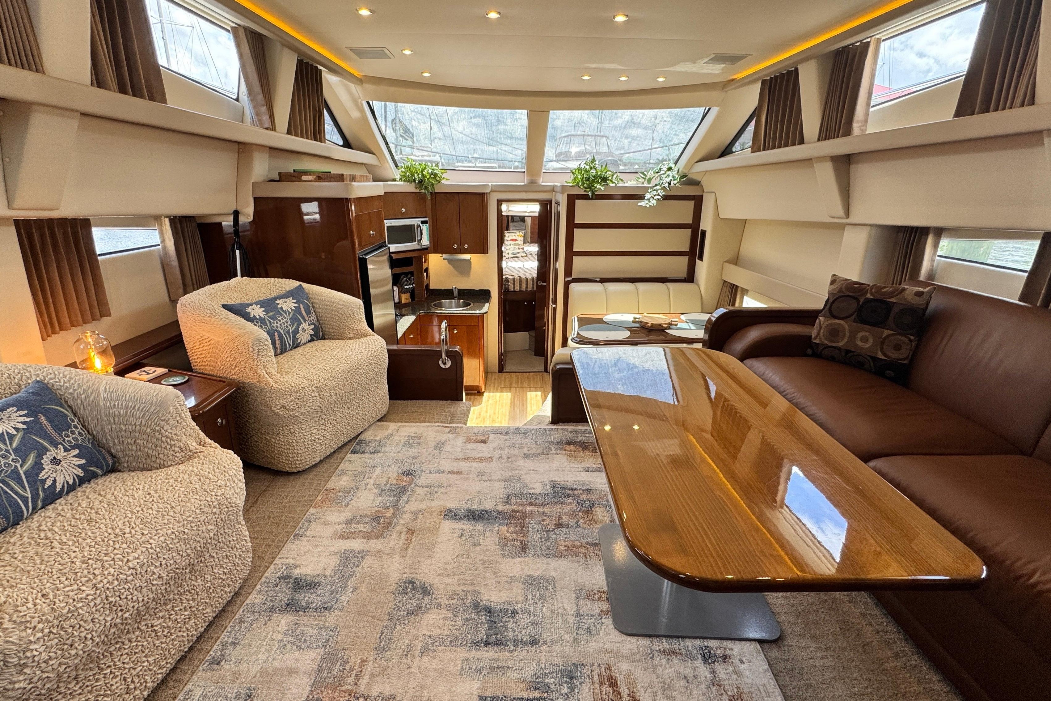 2007 Carver 47 Motor Yacht Salon with Plush Seating and Elegant Decor