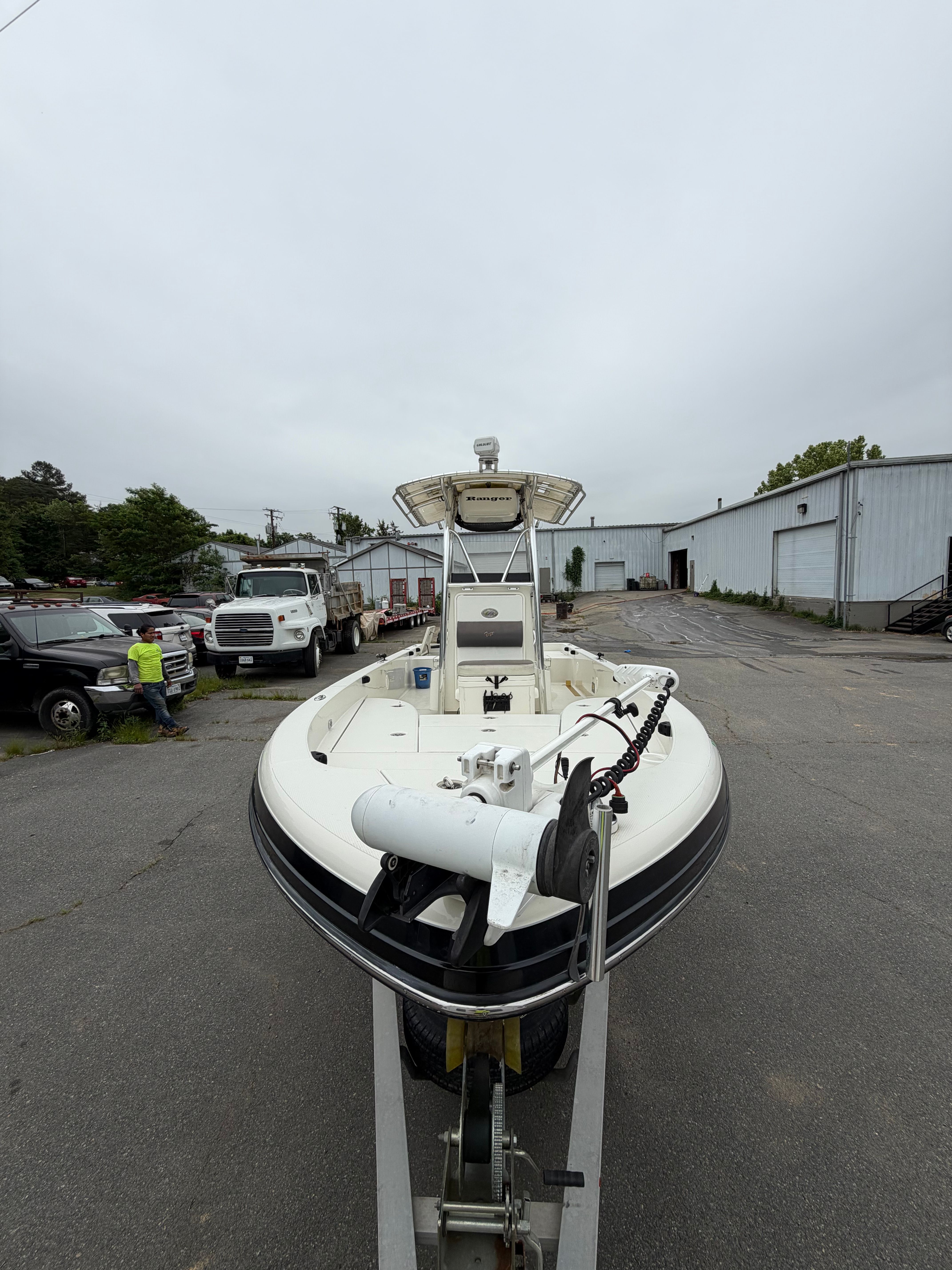 2008 Ranger 2400 Bay Ranger boat on trailer in a storage area.