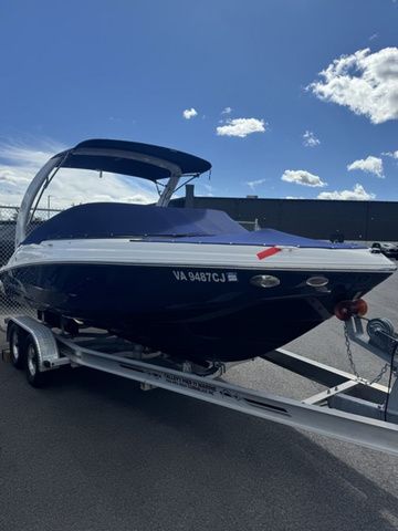 2022 Regal 2000 ES boat on trailer under blue sky.