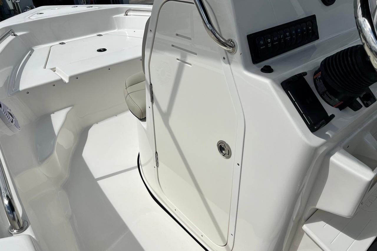 2026 Key West 189 FS boat interior, featuring sleek white design and modern controls.