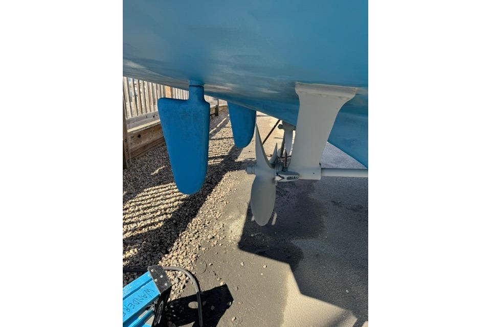Underwater view of 1983 Grand Banks 42 Motoryacht propeller and rudder.