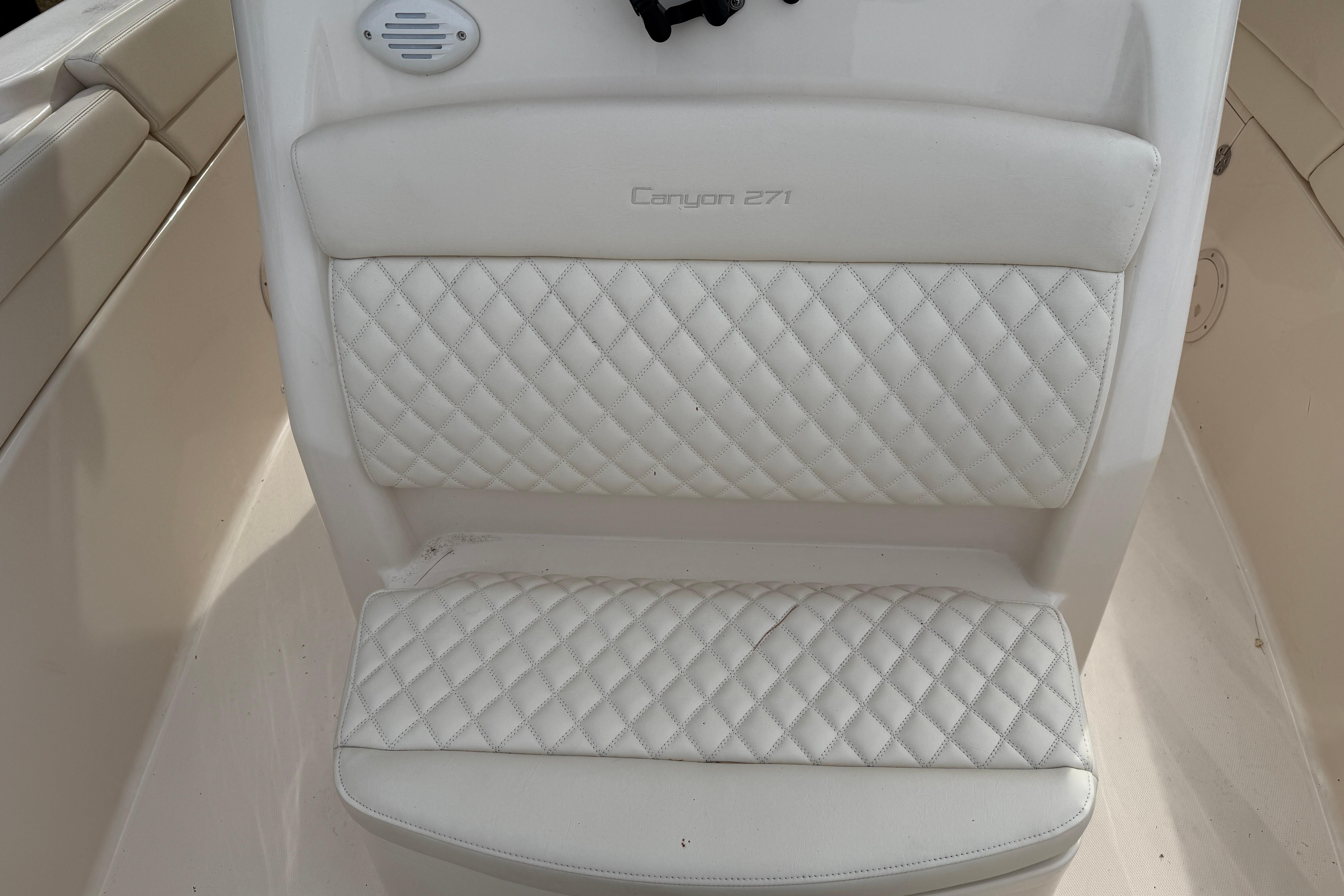2024 Grady-White Canyon 271 boat seat with diamond-stitched upholstery.