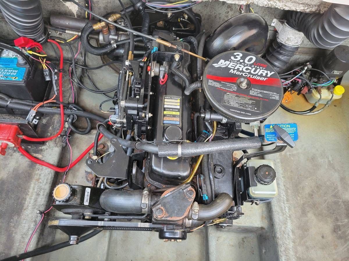 Engine compartment of a 2006 Glastron MX-195 Limited Edition boat with a 3.0 MerCruiser engine.