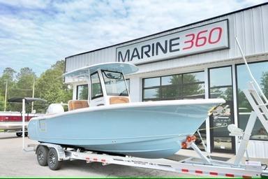 2026 Sea Hunt Ultra 255 SE boat on trailer at Marine 360 dealership.