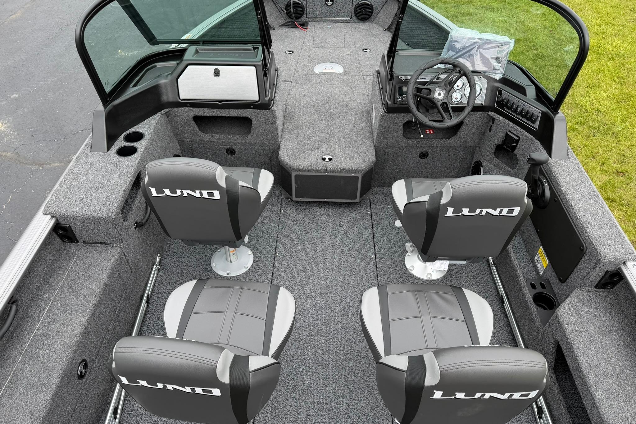 2027 Lund 1875 Impact XS Sport boat interior with four seats and steering console.