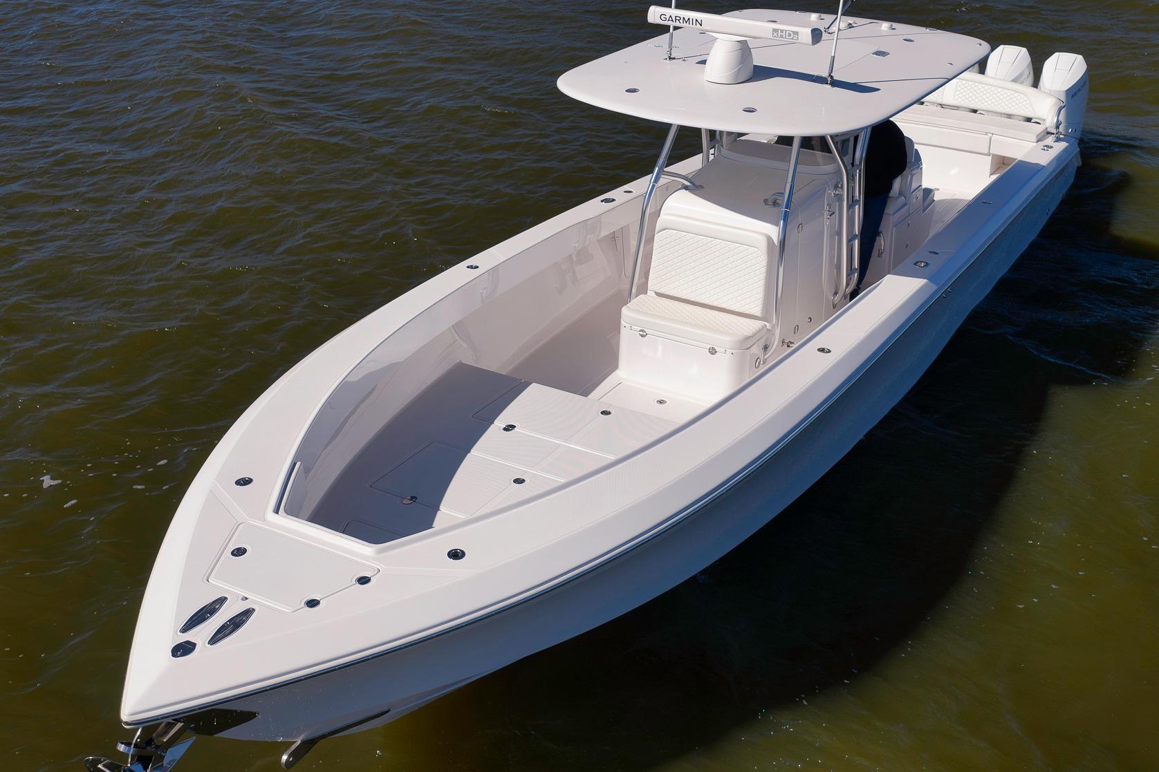 2024 Bahama 41 RD boat on water, showcasing sleek design and spacious deck.