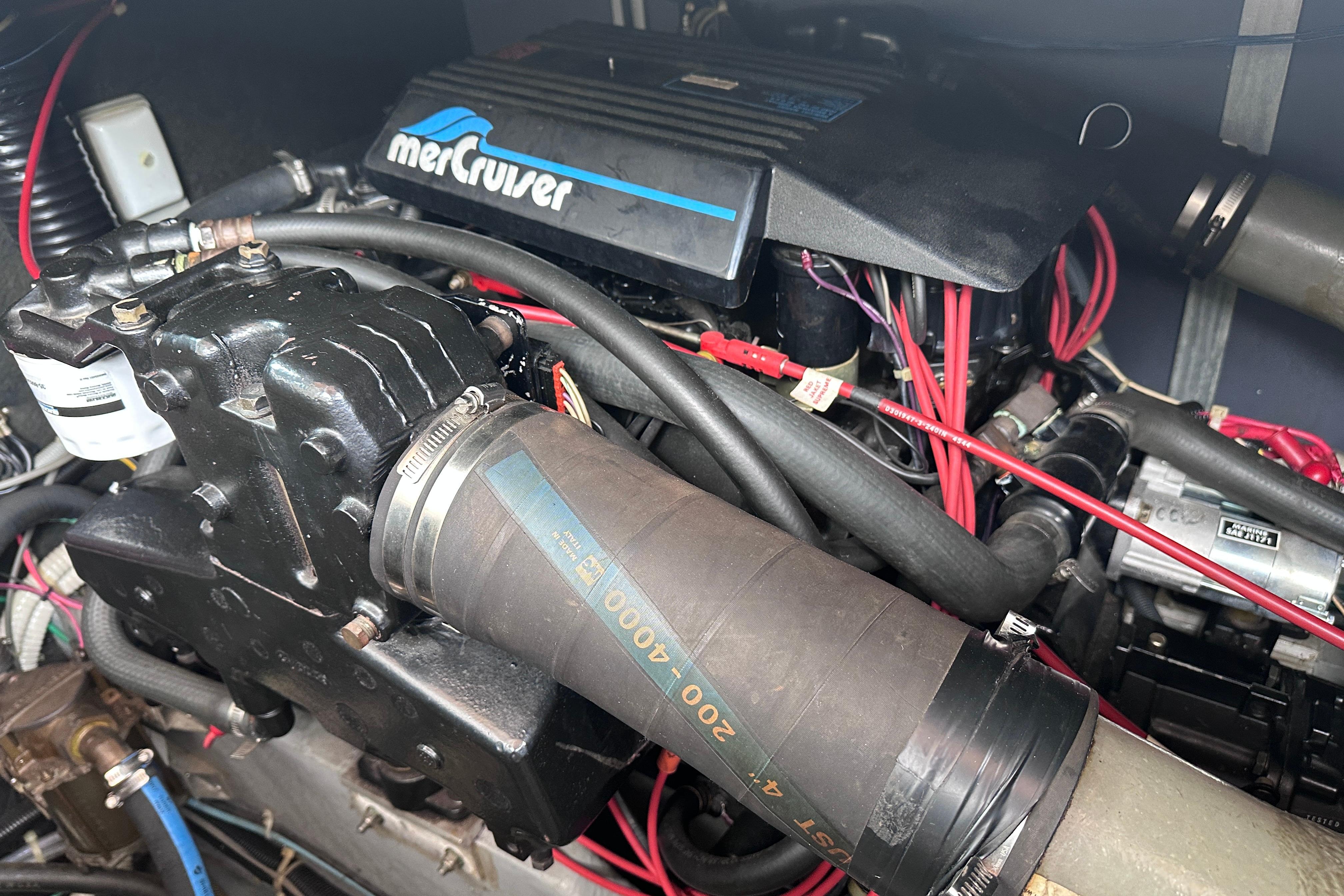 Engine compartment of a 1989 Sea Ray 390 Express Cruiser with MerCruiser components.