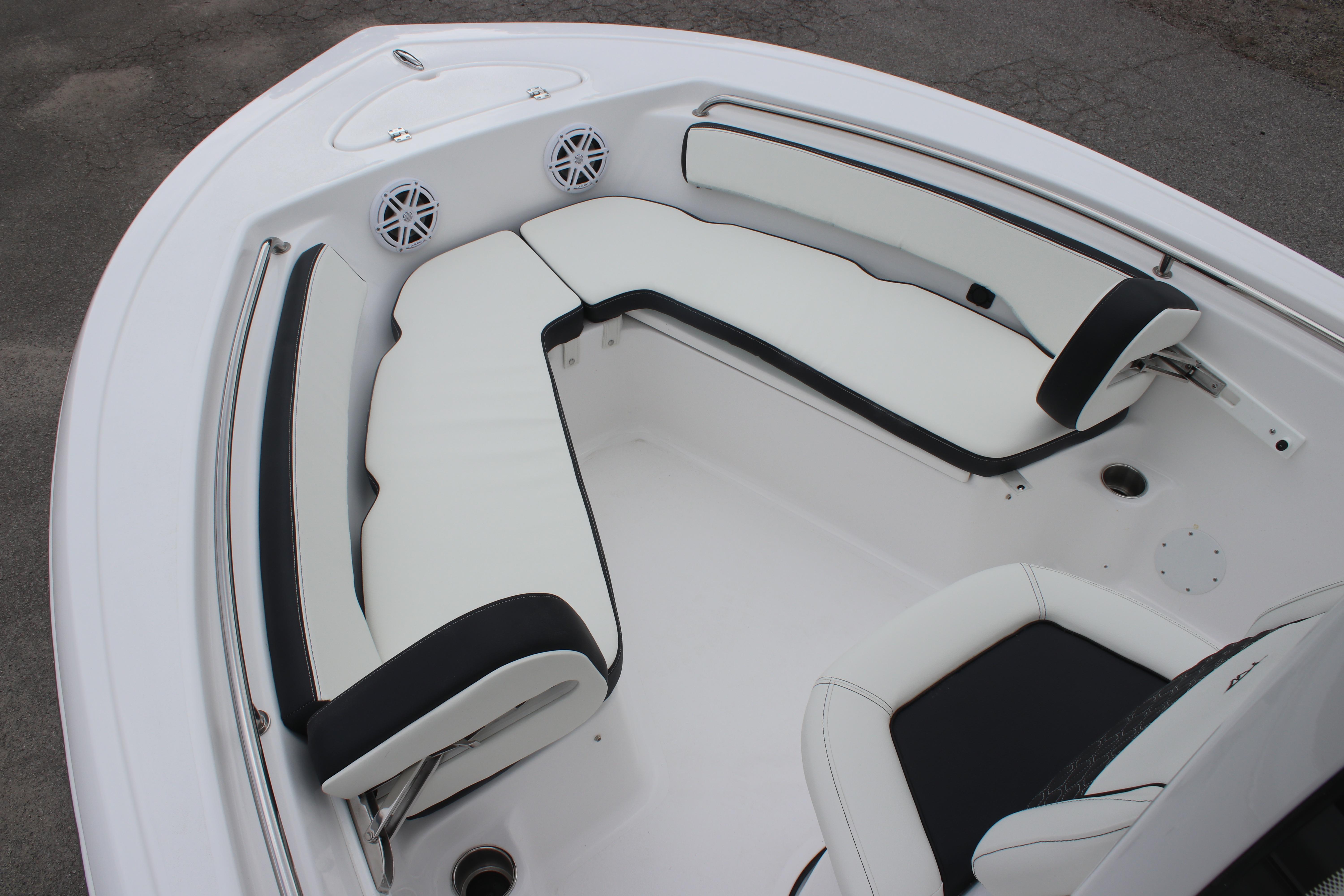 2026 Tidewater 198 CC Adventure boat interior with white cushioned seating.