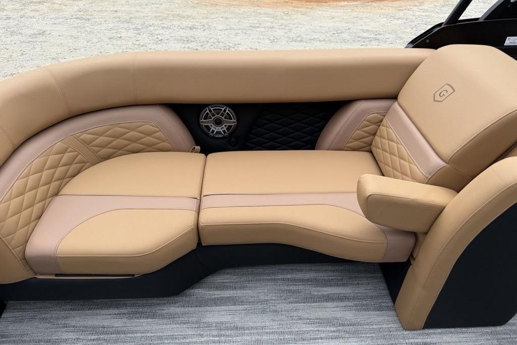 Luxurious tan seating on 2026 Godfrey Monaco 235 SFLC iMPACT boat.