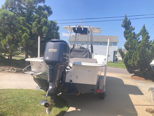 2011 Carolina Skiff 258 DLV boat with Yamaha 250 outboard motor on trailer.