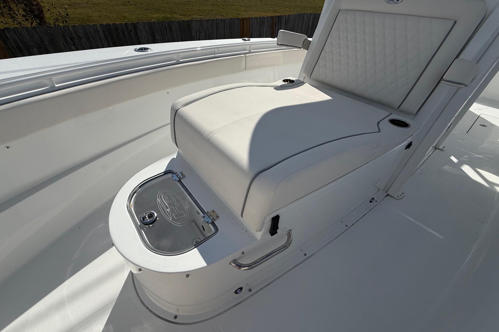 2026 Sea Hunt Ultra 285 Coffin Box boat interior with cushioned seating.