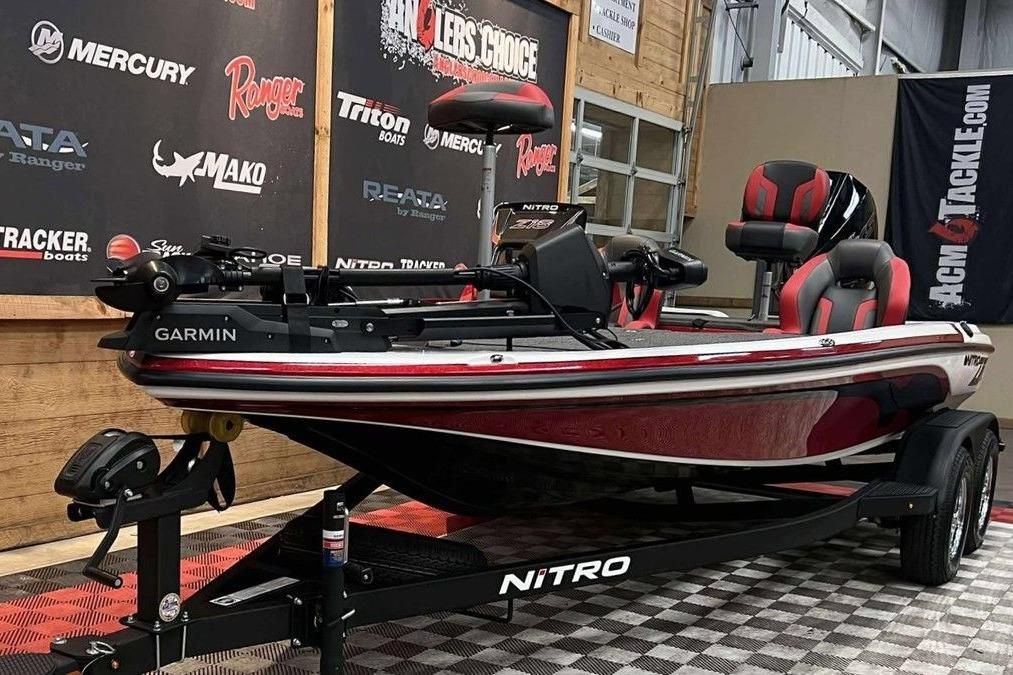 2026 Nitro Z18 Pro fishing boat with Garmin equipment on display in showroom.