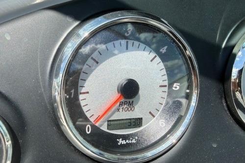 Tachometer of 2017 Rinker QX21 BR boat showing RPM reading.