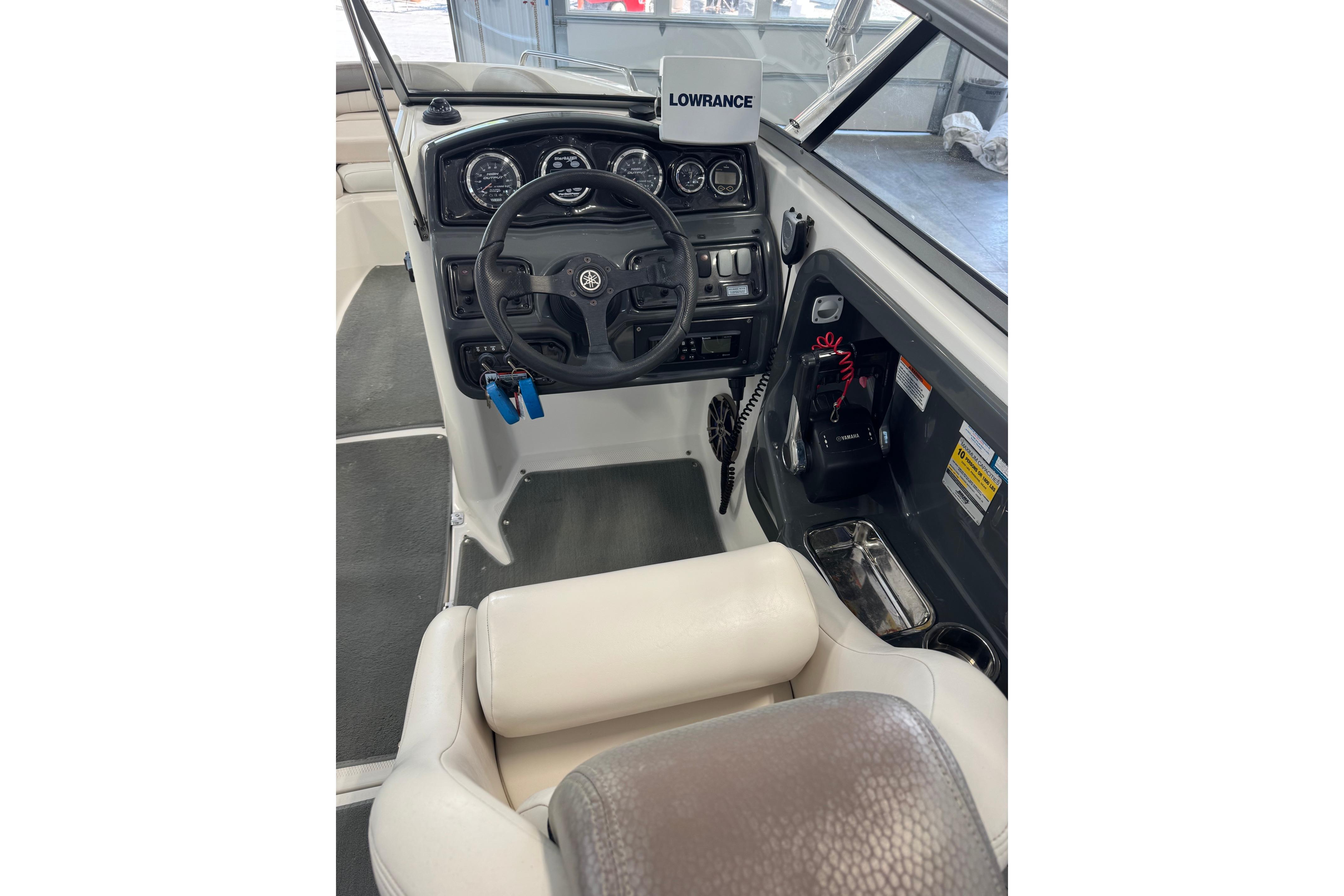 2007 Yamaha Boats SX230 HO cockpit with steering wheel and control panel.