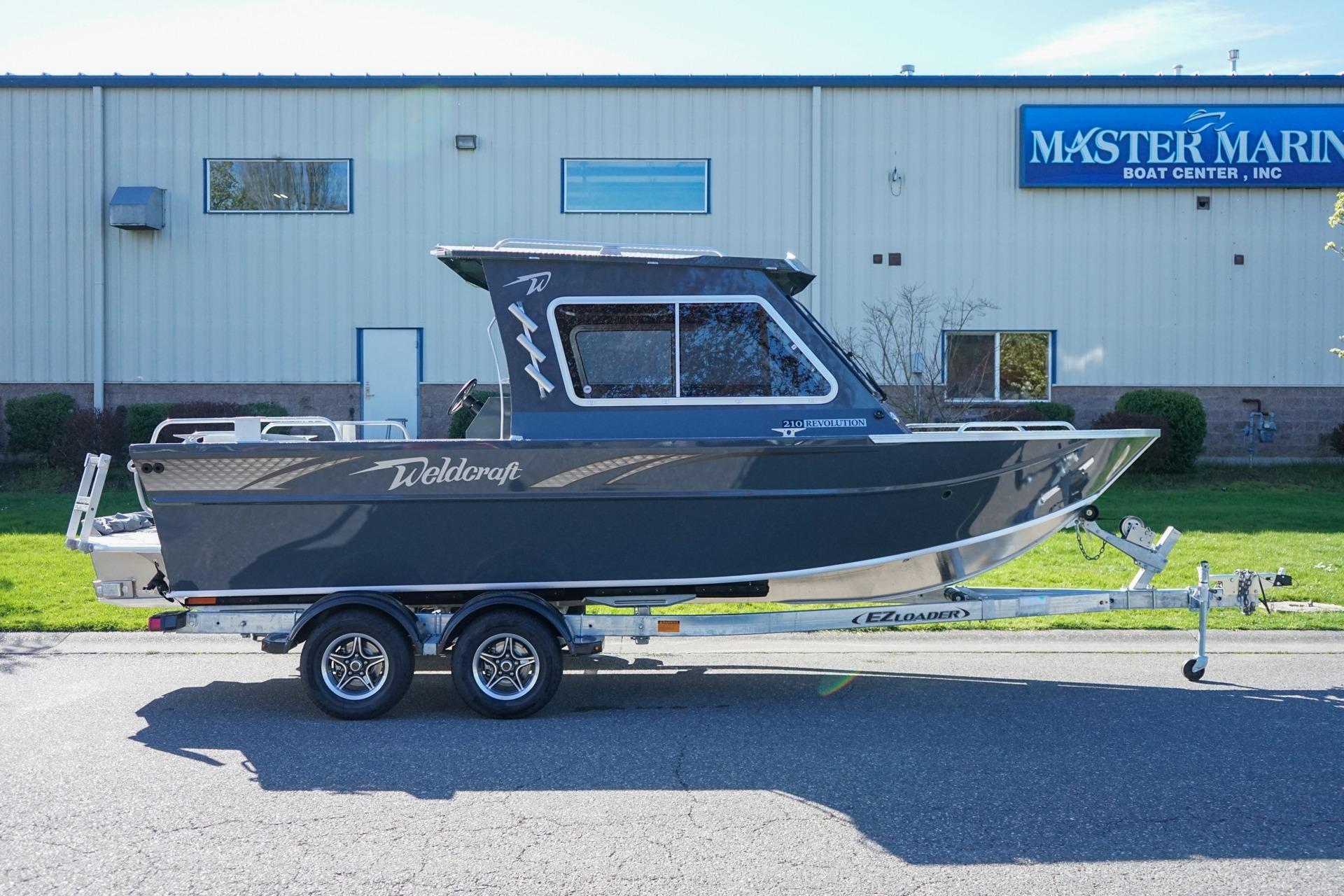 2026 Weldcraft 210 Revolution boat on trailer at Master Marine Boat Center.