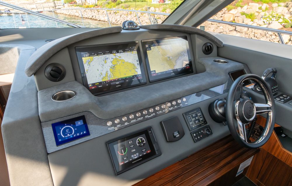 2022 Riviera 6000 Sport Yacht Platinum helm with advanced navigation displays and controls.