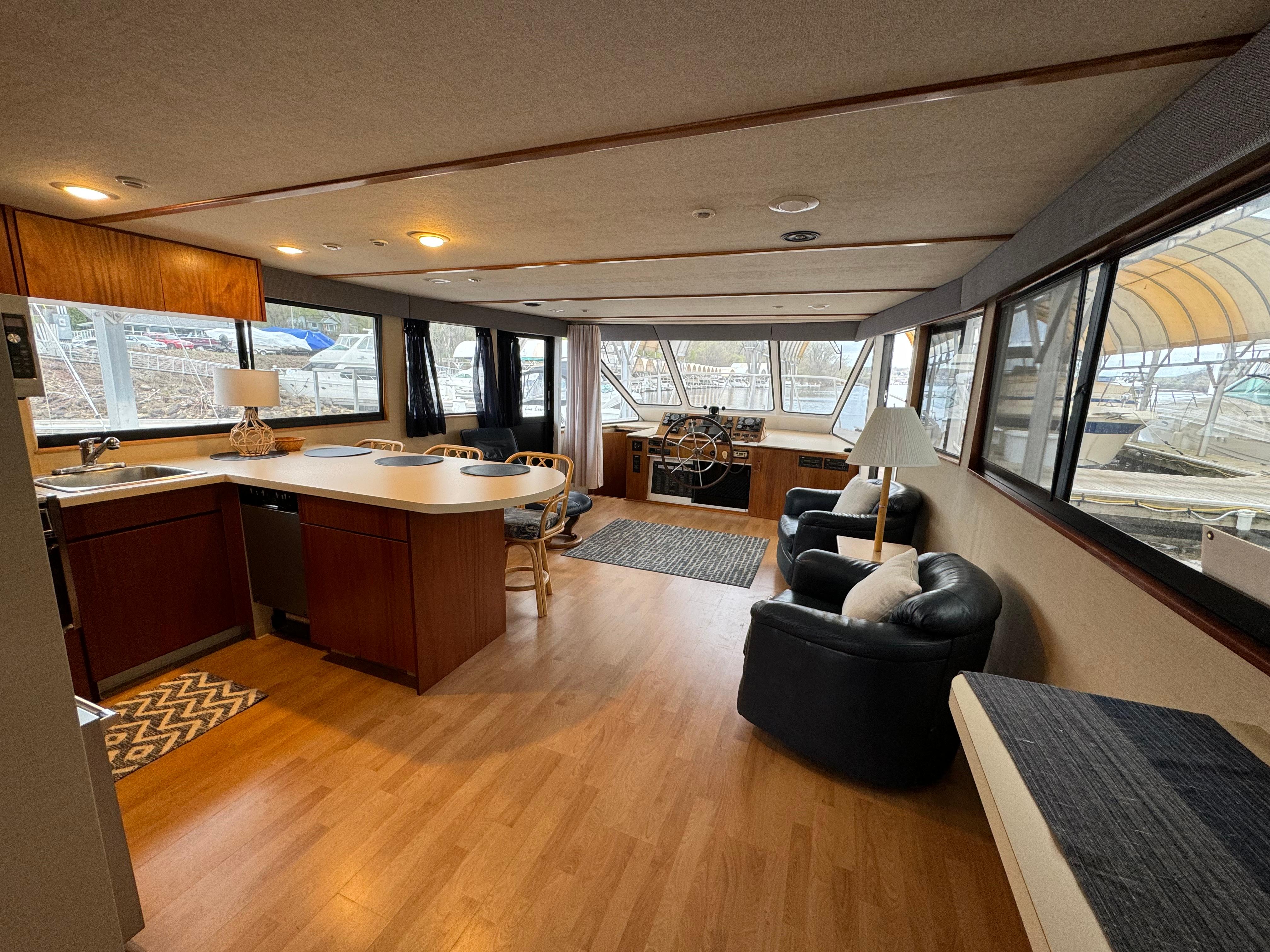 Interior of 1996 Skipperliner 560 Coastal Cruiser with modern kitchen and seating area.