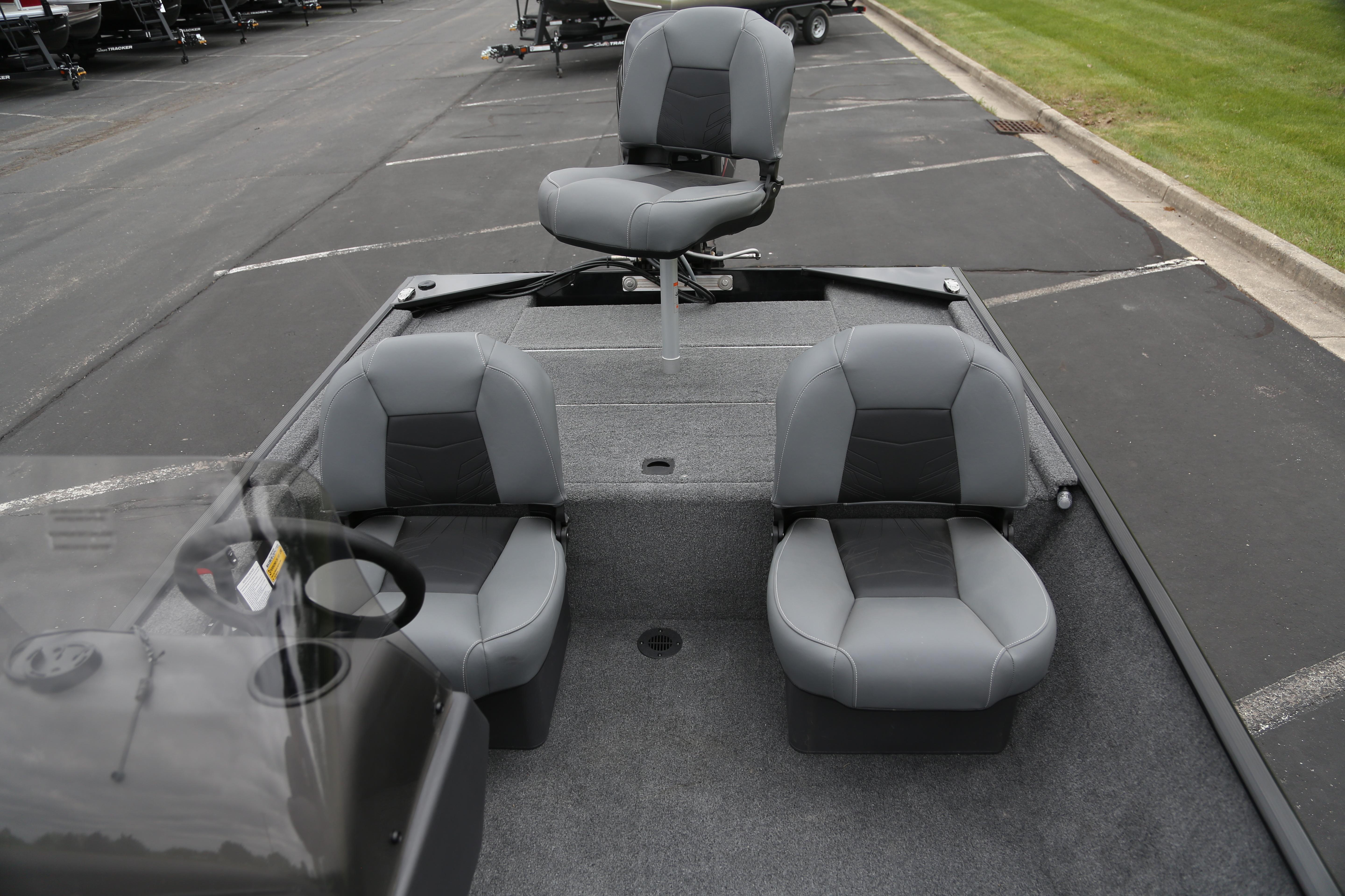 2026 Tracker Bass Tracker Classic XL boat interior with three gray seats.