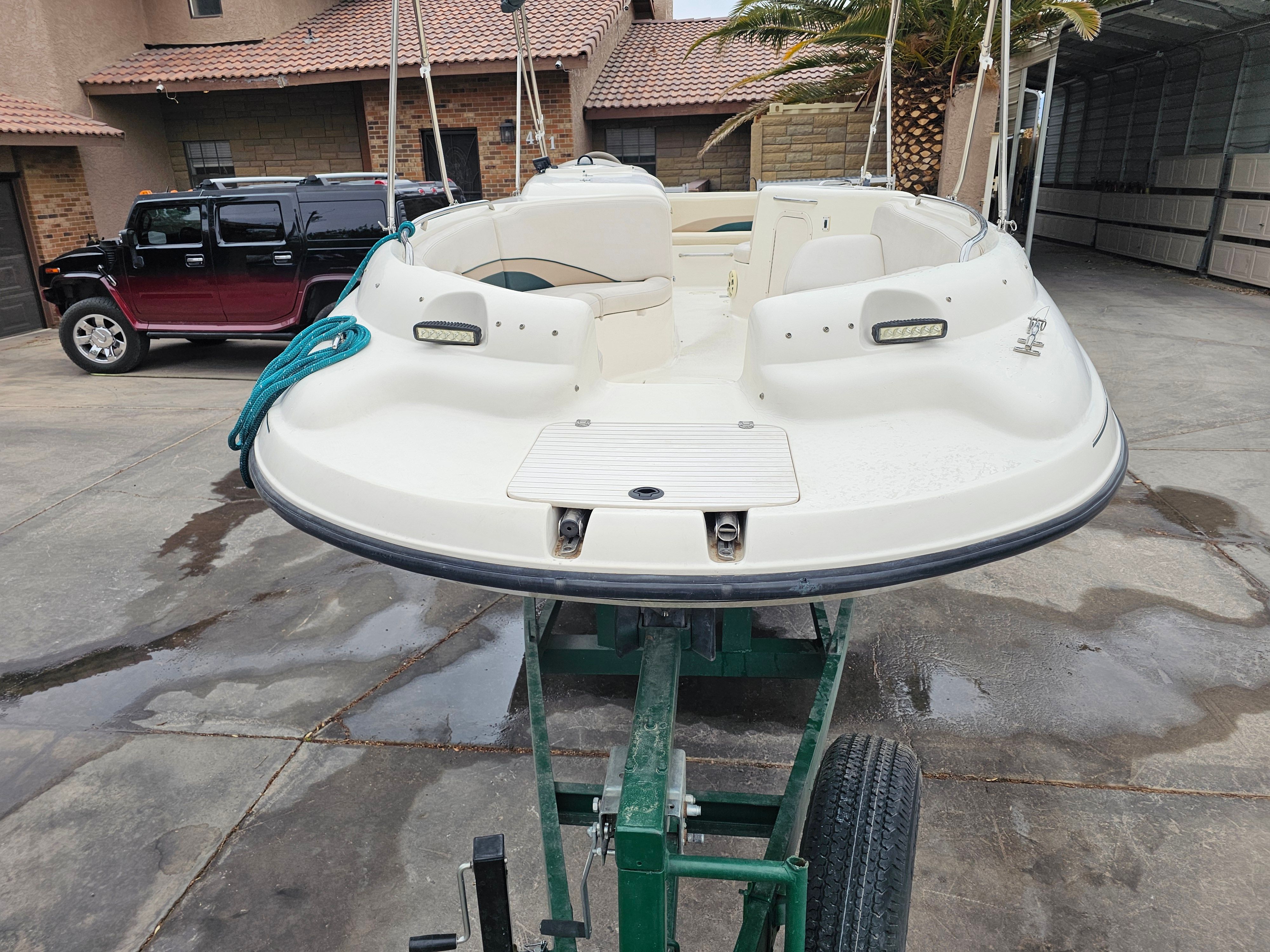 1998 Chaparral Sunesta 252 Special Edition boat on trailer.