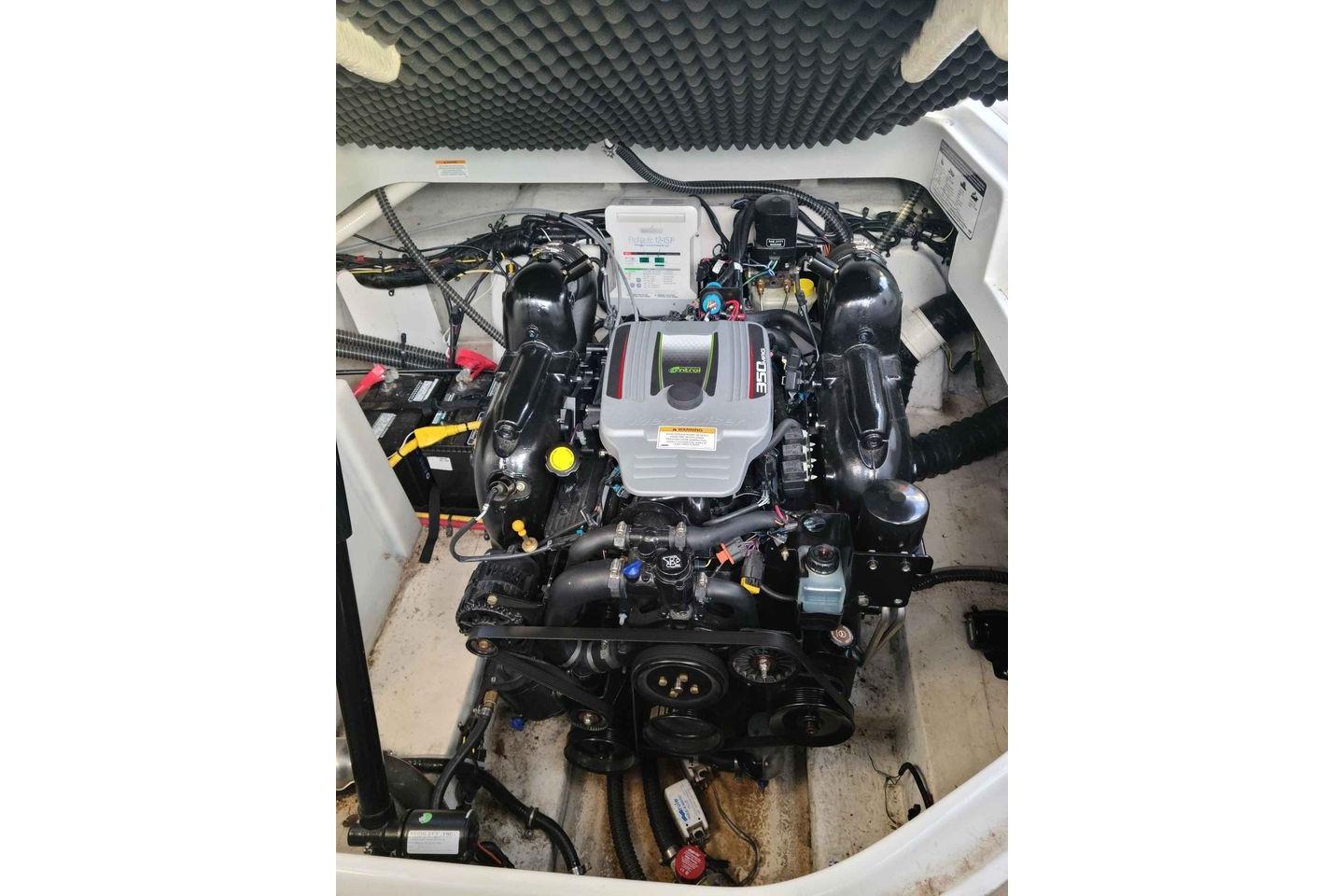 2016 Crownline 264 CR engine compartment with powerful inboard motor.
